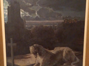 Pes ležící na hrobě svého pána