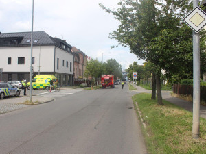 Páteční dopravní nehoda osobního auta a motocyklu